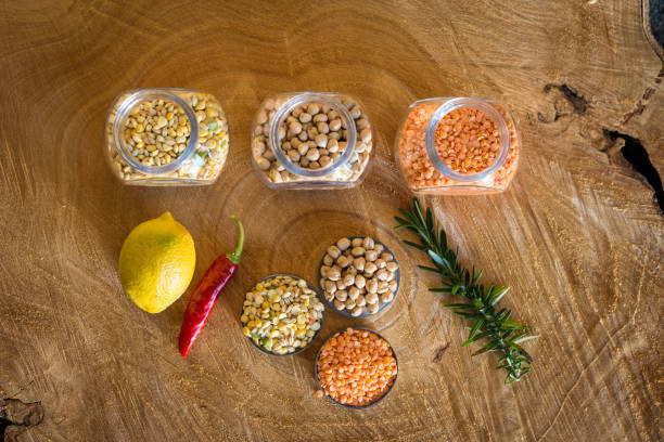 Raw cereals set on wooden background.